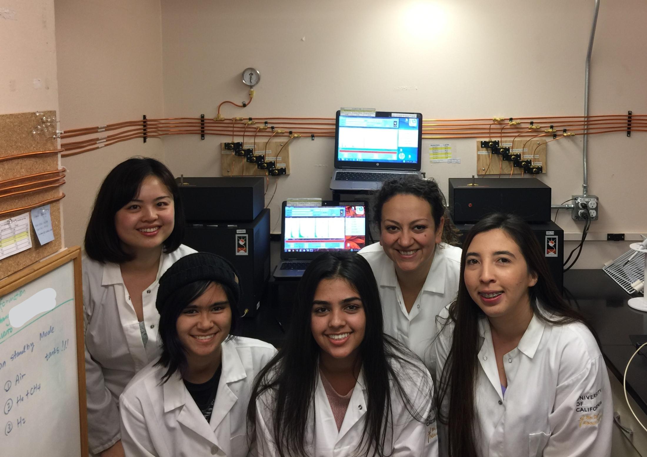 Image: carbon lab staff pose for photo in lab environment.